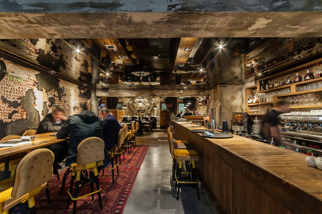 Hotel Hemera Podgorica Exterior foto Interior of a Starbucks Reserve store in Milan, Italy
