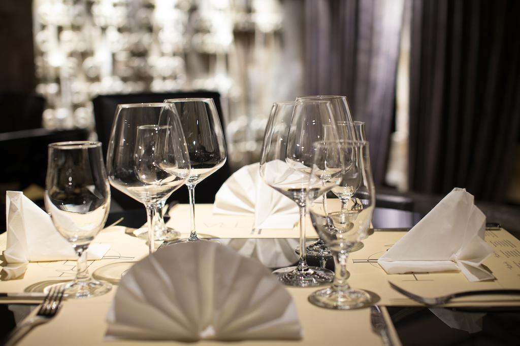Hotel Hemera Podgorica Exterior foto A table set for fine dining